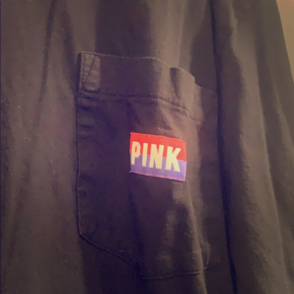 Pink women’s long sleeve campus tee. Size medium.